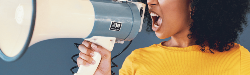 Lady shouting into megaphone